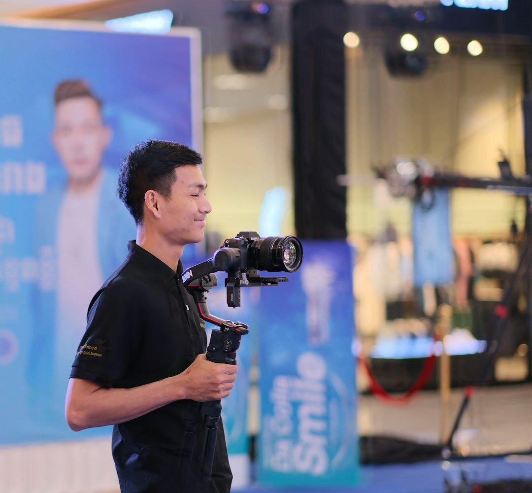 Professional man in business casual outfit, broadcast director